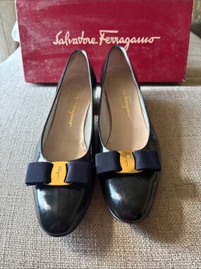 Salvatore Ferragamo Black Patent Vara Bow Flats with Gold Plaque